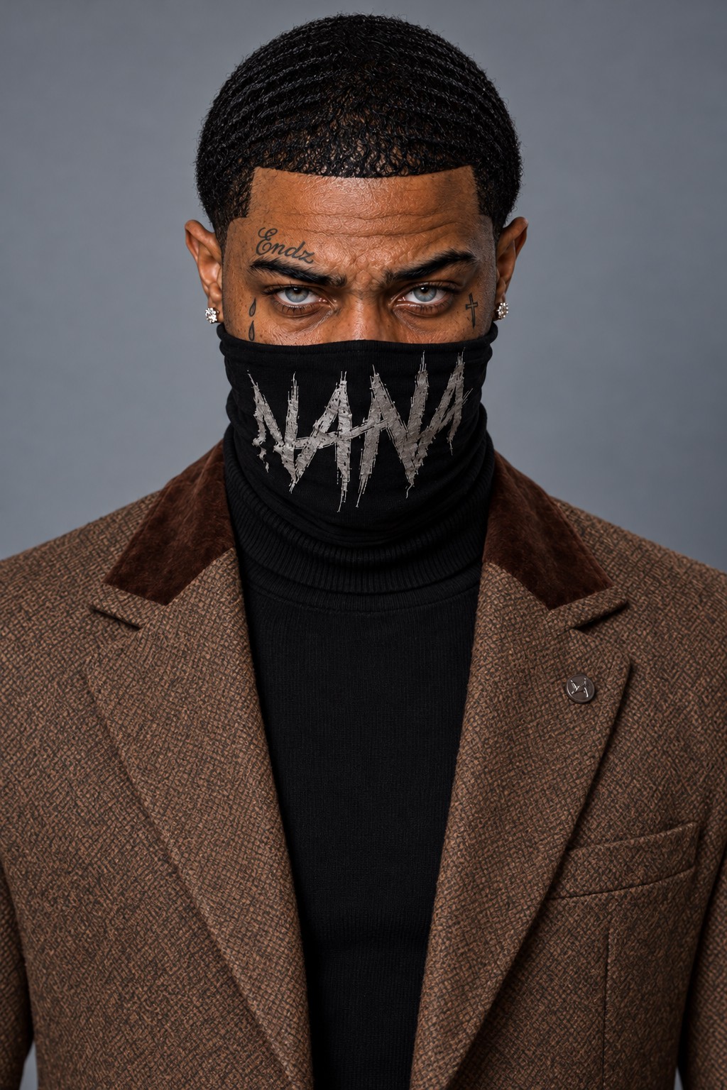 Nana Endz wearing his brown jacket and signature face covering